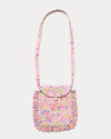 Early Sunday, Miss Sunday Sling in Emma Floral Purple color, made from Organic Printed Cotton Cambric fabric, featuring a frill detailed sling purse with flap closure, shown in front flat-lay view