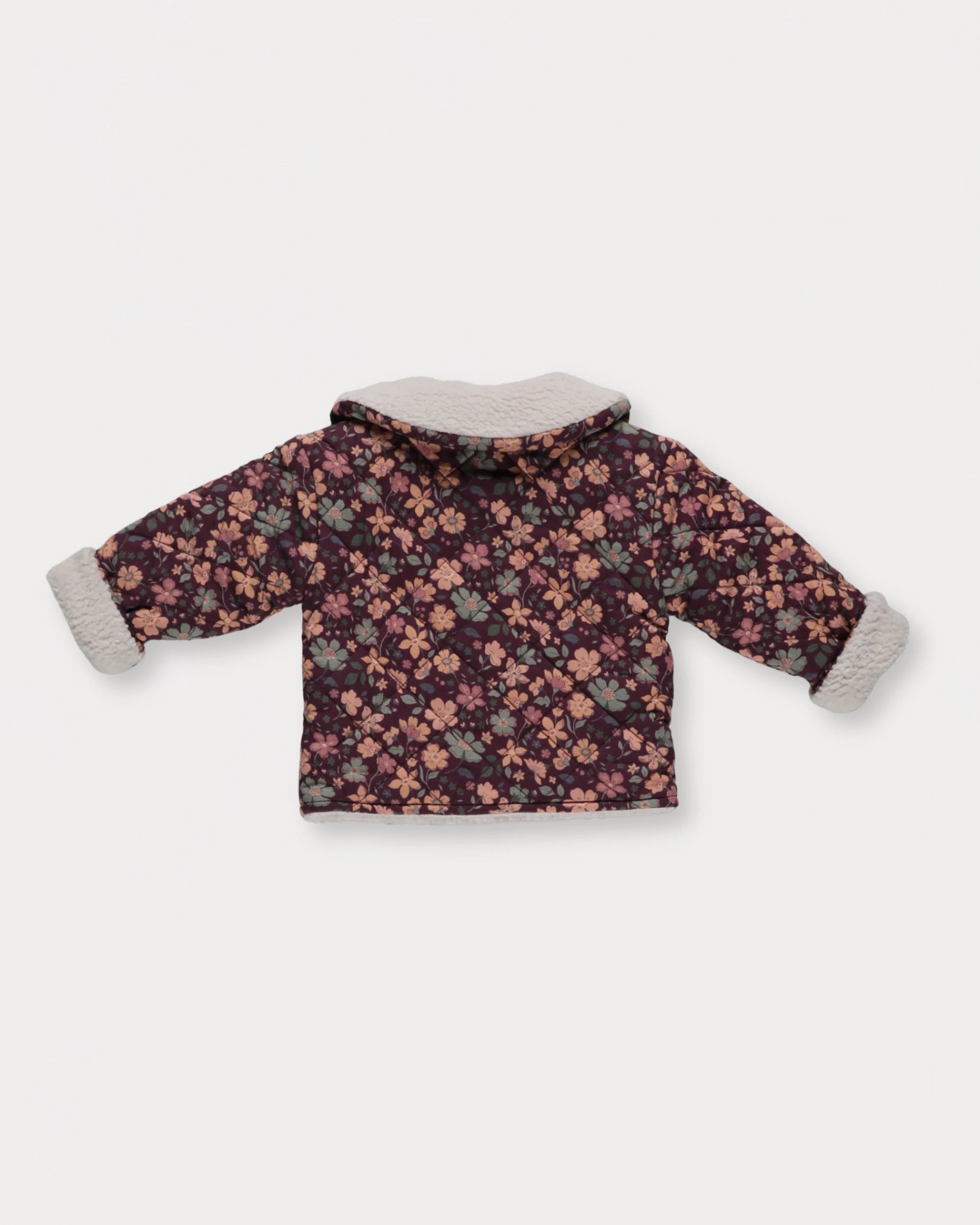 Early Sunday, Molly Baby Quilted Jacket in Garden Flowers Plum, made from Printed Cotton Satin fabric, featuring a sherpa collar & cuffed sleeves, shown in a back flat-lay view