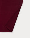 Early Sunday, Napkin in Plum, made from Cotton Double Gauze fabric, featuring featuring a soft and comfortable design with an adjustable fit, shown in a closeup flat-lay view