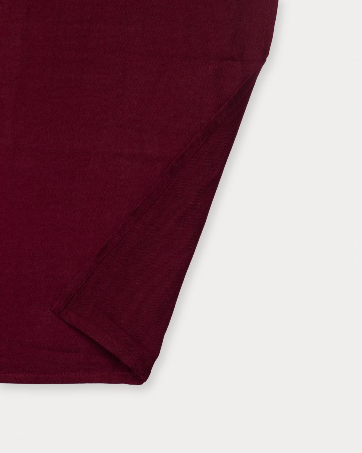 Early Sunday, Napkin in Plum, made from Cotton Double Gauze fabric, featuring featuring a soft and comfortable design with an adjustable fit, shown in a closeup flat-lay view