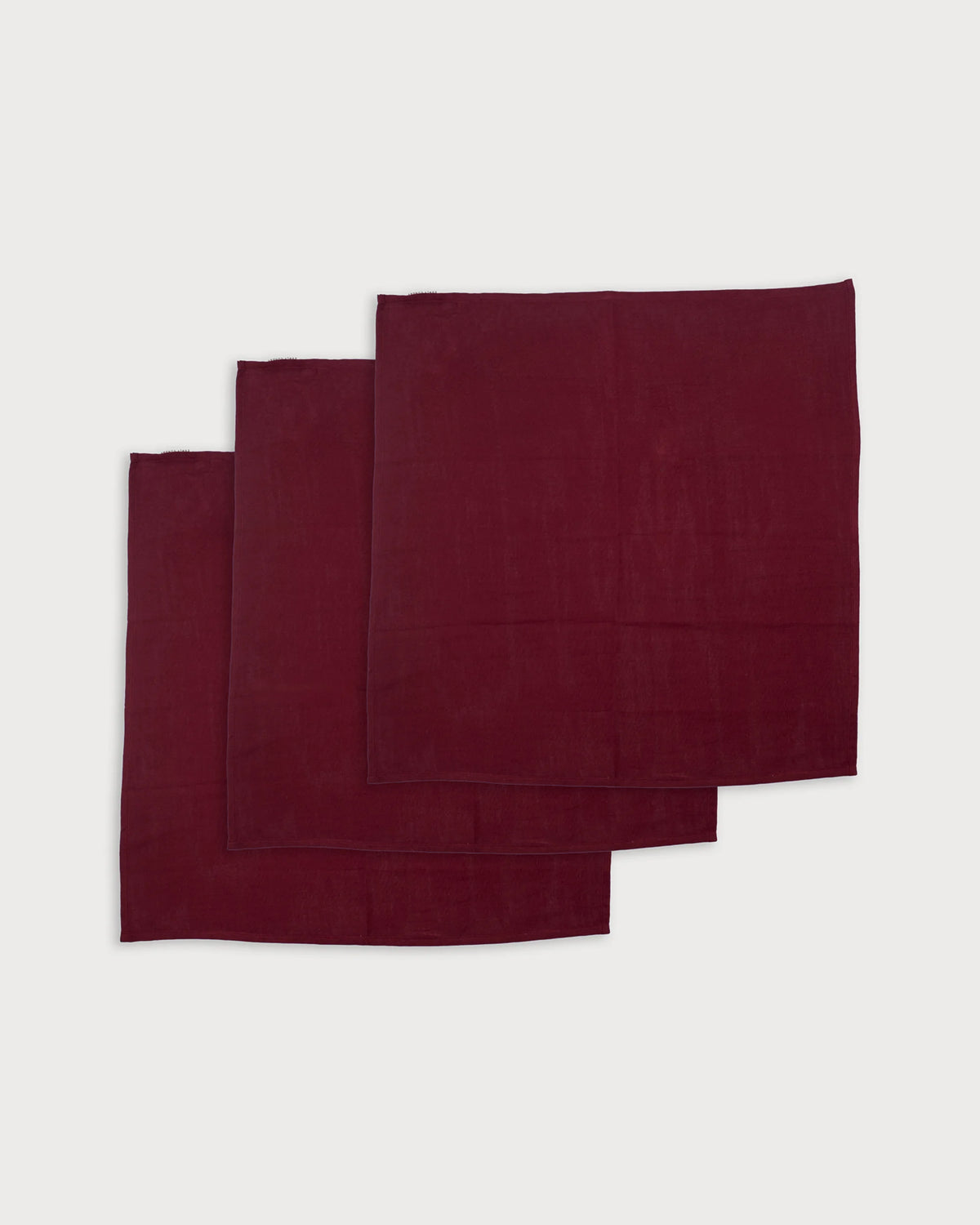 Early Sunday, Napkin in Plum, made from Cotton Double Gauze fabric, featuring featuring a soft and comfortable design with an adjustable fit, shown in a front flat-lay view