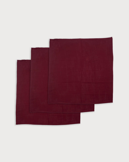 Early Sunday, Napkin in Plum, made from Cotton Double Gauze fabric, featuring featuring a soft and comfortable design with an adjustable fit, shown in a front flat-lay view