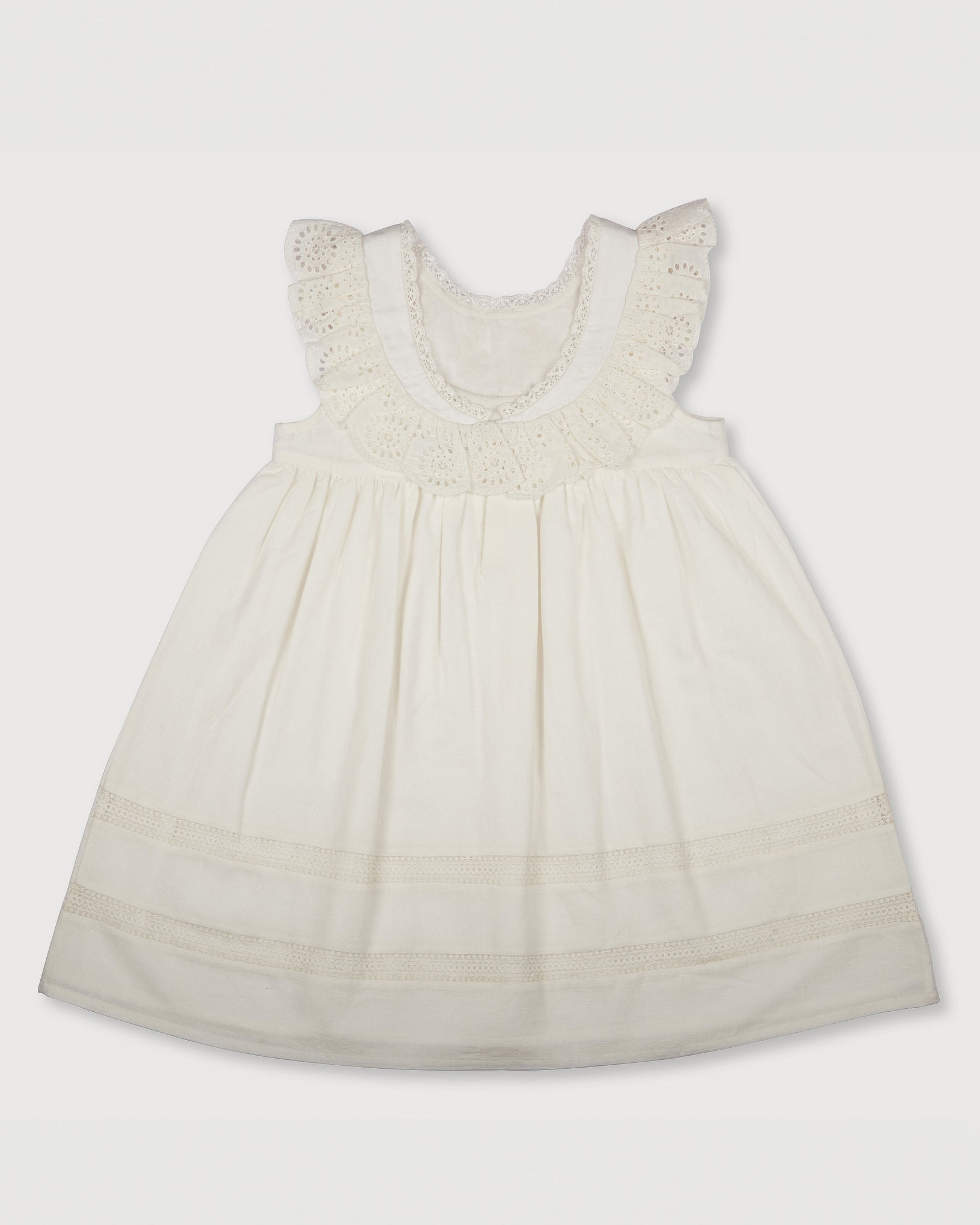 Early Sunday, Natasha Dress in Ivory color, made from 70% Cotton x 30% Linen fabric, featuring flattering fit with delicate finishes, combining style and functionality for an effortlessly elegant look, shown in a back flat-lay view