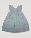 Early Sunday, Natasha Dress in Sea Dream color, made from All-Over Eyelet Embroidered Cotton Schifflie fabric, featuring flattering fit with delicate finishes, combining style and functionality for an effortlessly elegant look, shown in a front flat-lay view