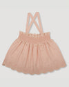 Early Sunday, Olivia Blouse in Pink Sand color, made from Canvas 70% Cotton 30% Linen fabric, featuring smocked bodice for a flexible fit, cross-back strap sand a flared hem, shown in a back flat lay view