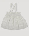 Early Sunday, Olivia Blouse in Mini Flower print, made from Printed canvas 70% Cotton 30% Linen fabric, featuring smocked bodice for a flexible fit, cross-back straps and a flared hem shown in a front flat-lay view