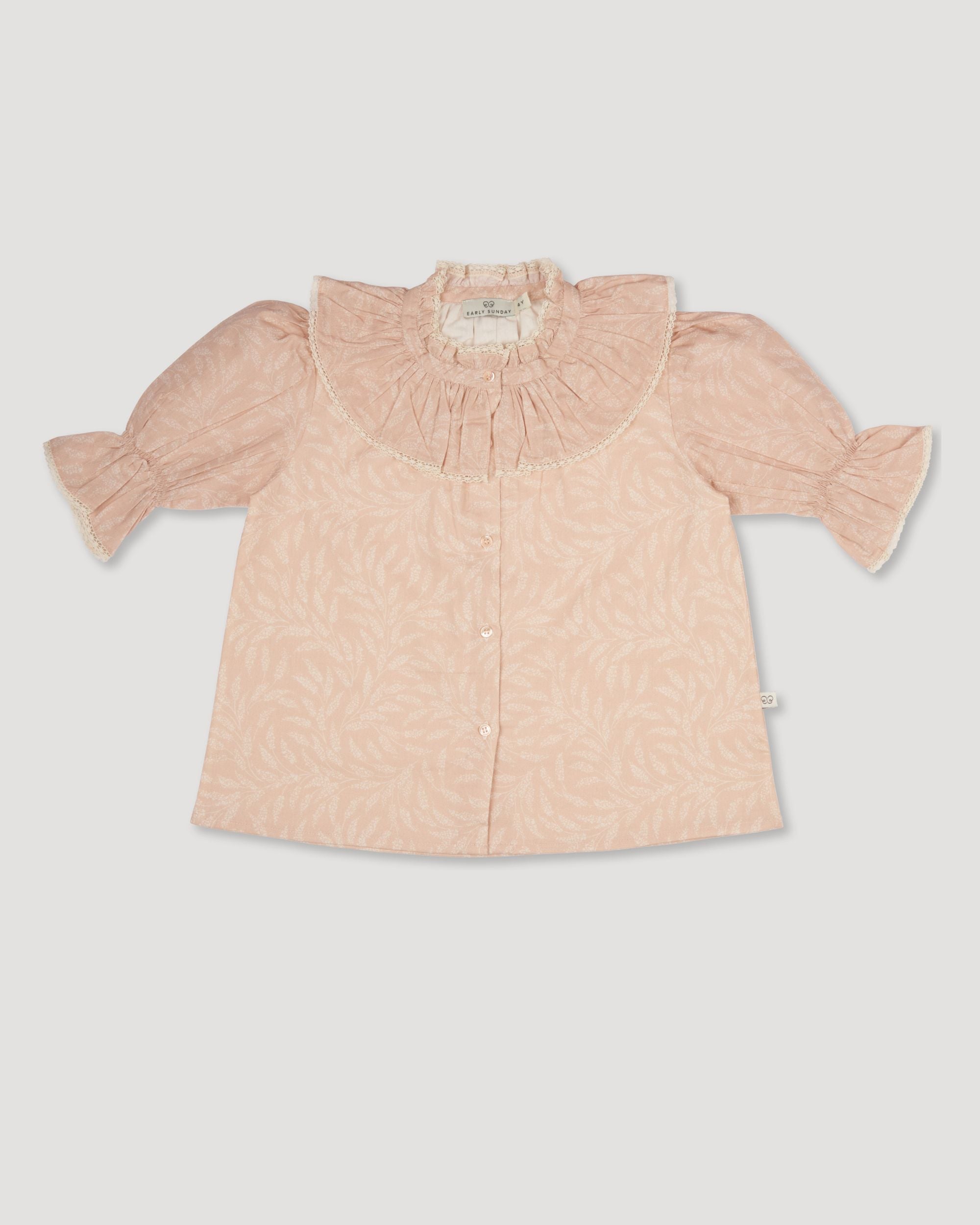Early Sunday, Ophelie Blouse in Feather print, made from Printed Cotton Cambric fabric, featuring Comfort-first design with a playful silhouette and French seams, shown in a front flat-lay view