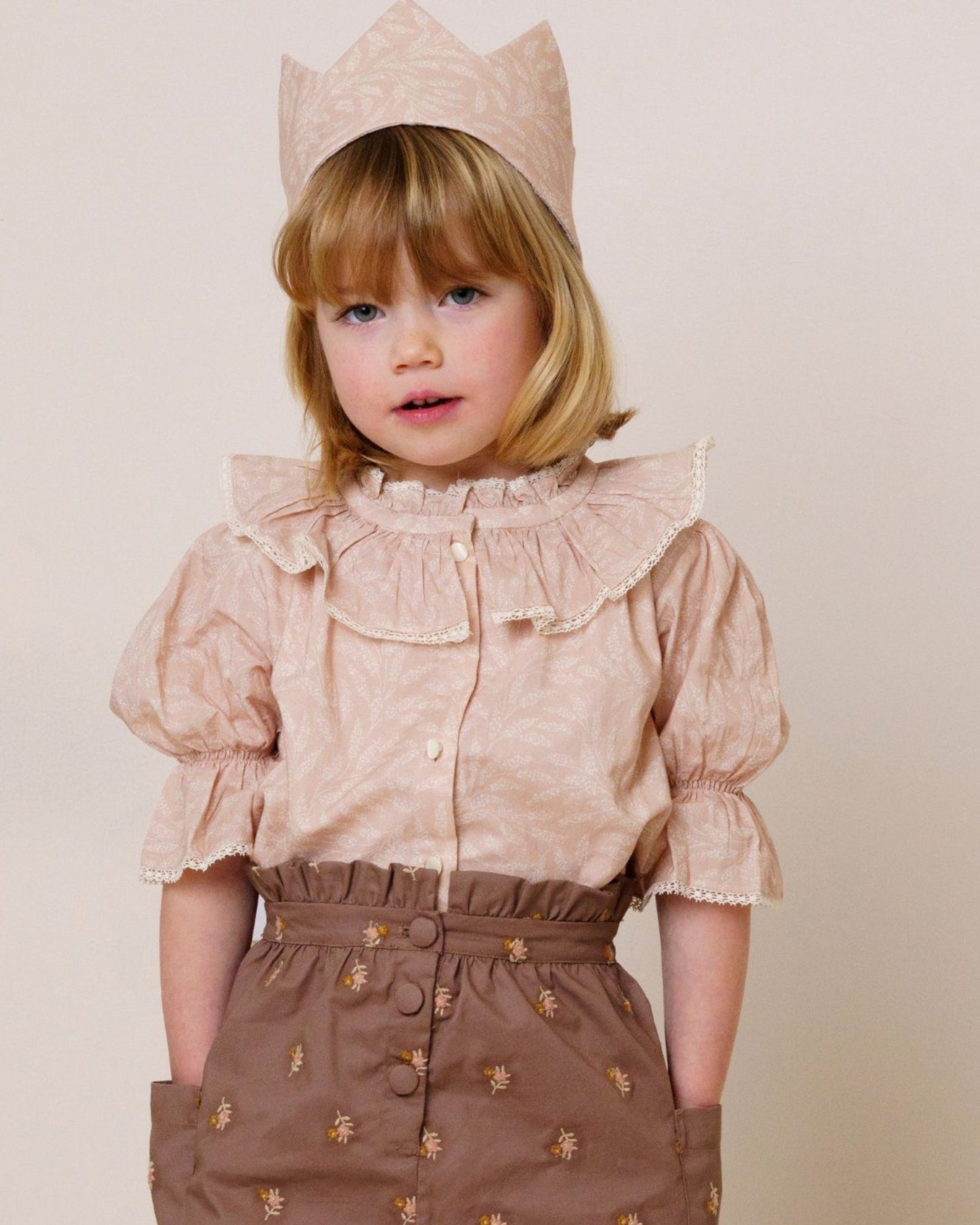 Early Sunday, Ophelie Blouse in Feather print, made from Printed Cotton Cambric fabric, featuring Comfort-first design with a playful silhouette and French seams, shown in a front view of model wearing it