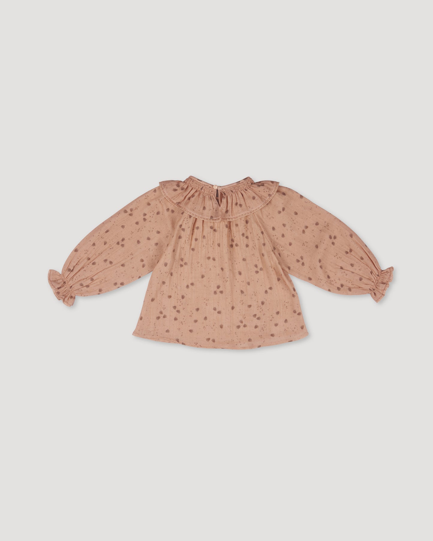 Early Sunday, Paloma Blouse in Acorn Dusty Pink, made from Printed Cotton Double Gauze fabric, featuring relaxed fit with a ruffle neckline, shown in a front flat-lay view