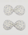 Early Sunday, Penelope Alligator Clip in Mini Flower print, made from Printed canvas 70% Cotton 30% Linen fabric, featuring a fabric bow design with a secure hair clip fastening, shown in a front flat-lay view