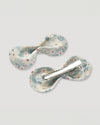 Early Sunday, Penelope Alligator Clip in Amelia print, made from Printed Cotton Cambric fabric, featuring a bow design on an alligator clip with a secure fit, shown in a back flat-lay view