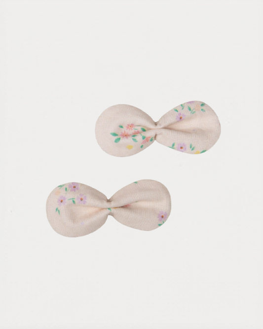 Early Sunday, Penelope Clip in Painted Bouquet print, made from Printed 70% Cotton, 30% Linen fabric, featuring a set of two bow clips with a secure fit, shown in a front flat-lay view