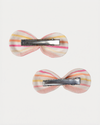 Early Sunday, Penelope Clip in Pink Stripes print, made from Printed 70% Cotton, 30% Linen fabric, featuring a set of two bow clips with a secure fit, shown in a back flat-lay view