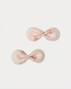 Early Sunday, Penelope Clip in Butterflies print, made from Printed Cotton Tiny Swiss Dobby fabric, featuring a set of two bow clips with a secure fit, shown in a front flat-lay view