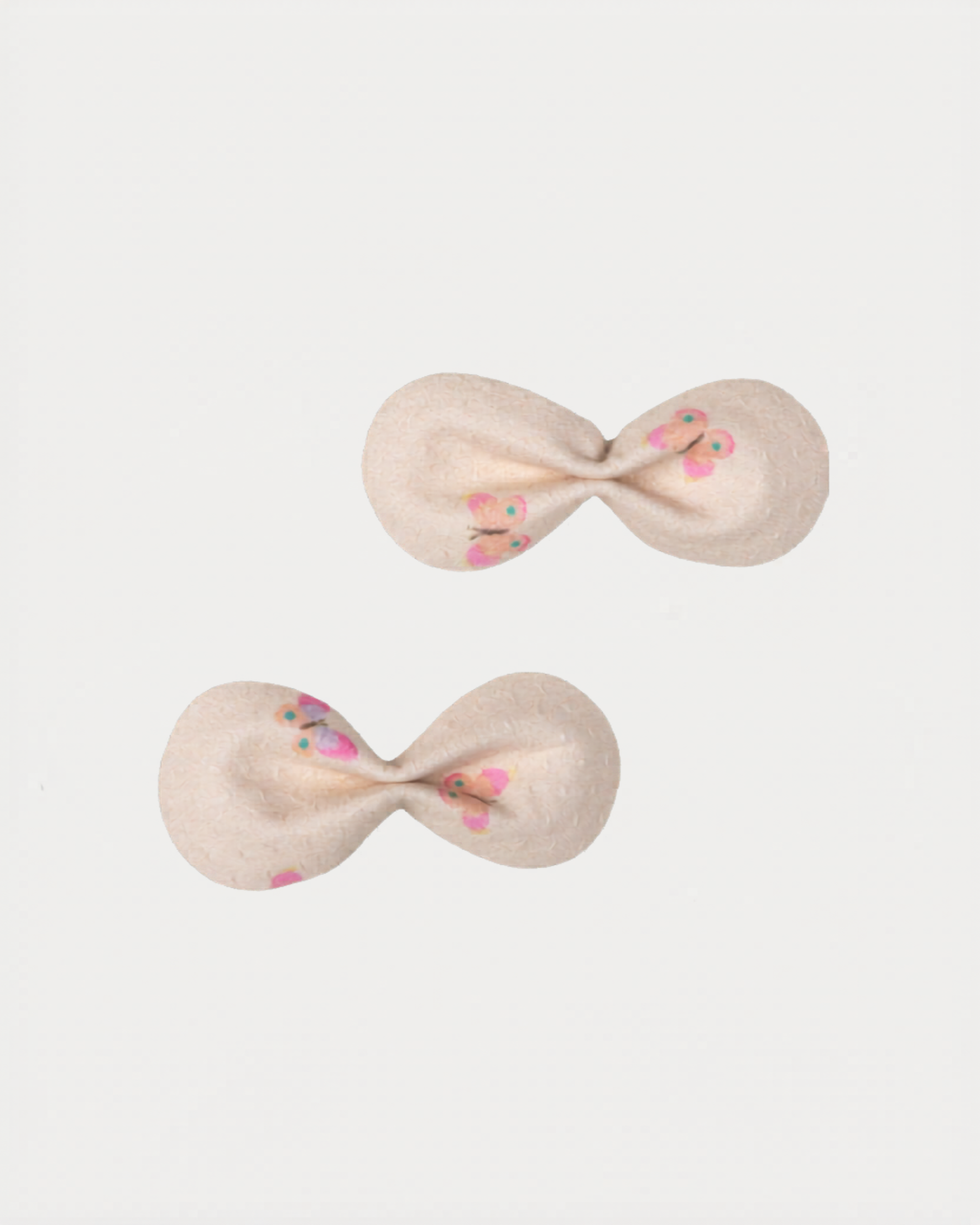 Early Sunday, Penelope Clip in Butterflies print, made from Printed Cotton Tiny Swiss Dobby fabric, featuring a set of two bow clips with a secure fit, shown in a front flat-lay view