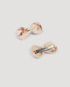 Early Sunday, Penelope Clip in Ditsy Bouquet Cream print, made from Printed Viscose Twill fabric, featuring a set of two bow clips with a secure fit, shown in a back flat-lay view