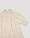 Early Sunday, Penelope Dress in Hazelnut Cream, made from All-Over Embroidered Cotton Cambric fabric, featuring Hand-embroidered floral motifs, shown in a closeup flat-lay view