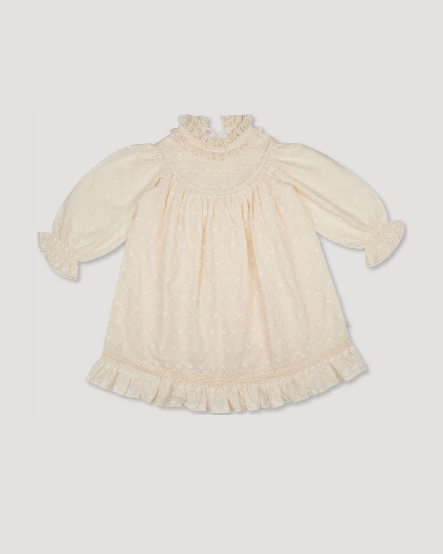 Early Sunday, Penelope Dress in Hazelnut Cream, made from All-Over Embroidered Cotton Cambric fabric, featuring Hand-embroidered floral motifs, shown in a front flat-lay view