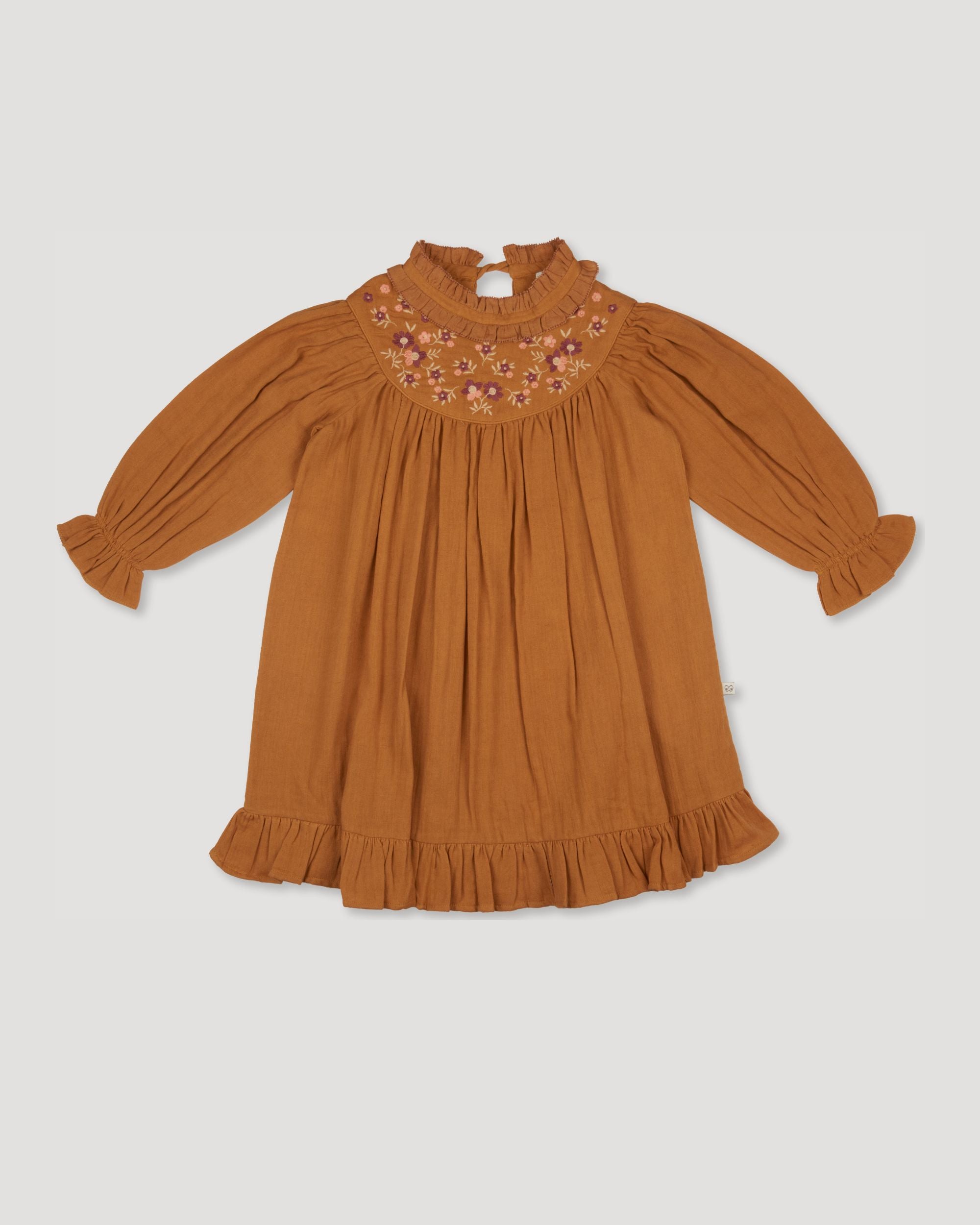 Early Sunday, Penelope Dress in Almond, made from Dyed Cotton Double Gauze fabric, featuring Hand-embroidered floral motifs, shown in a front flat-lay view