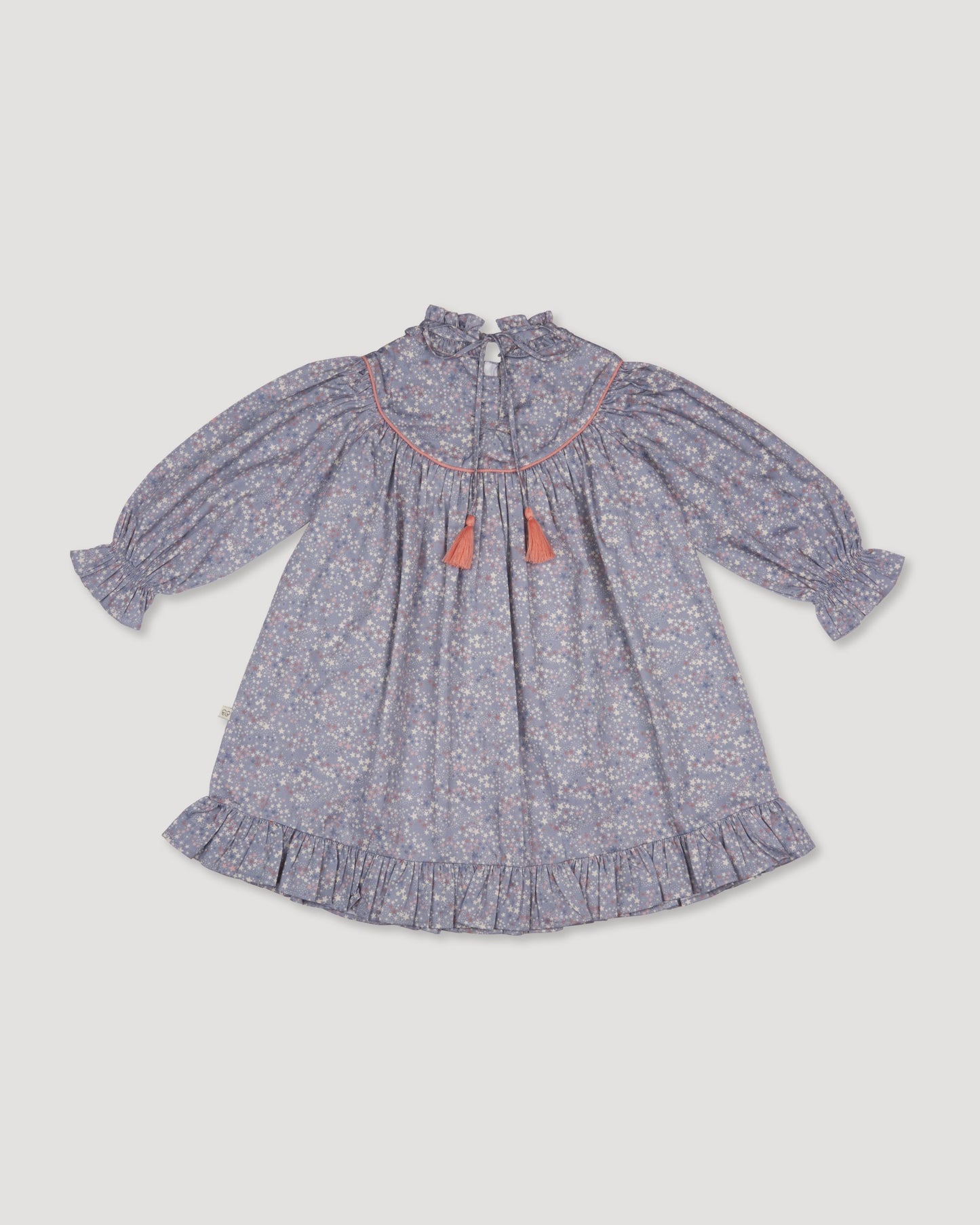 Early Sunday, Penelope Dress in Celestial print, made from Printed Cotton Satin fabric, featuring Hand-embroidered floral motifs, shown in a back flat-lay view