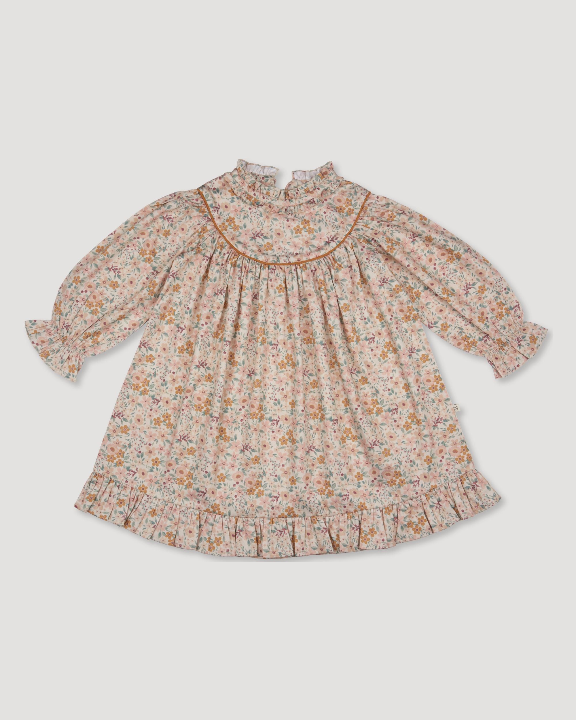 Early Sunday, Penelope Dress in Floral print, made from Printed Cotton Satin fabric, featuring Hand-embroidered floral motifs, shown in a front flat-lay view