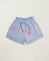 Early Sunday, Roman Short in Summer Sky color, made from 100% Cotton Chambray fabric, featuring a relaxed fit with an elastic waistband & beautiful embroidery, shown in a front flat-lay view