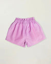 Early Sunday, Roman Short in Lilac color, made from 70% Cotton 30% Linen fabric, featuring a relaxed fit with an elastic waistband & beautiful embroidery, shown in a back flat-lay view