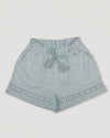 Early Sunday, Roman Shorts in Sea Dream color, made from All-Over Eyelet Embroidered Cotton Schifflie fabric, featuring relaxed fit with delicate finishes, combining style and functionality, shown in a front flat-lay view
