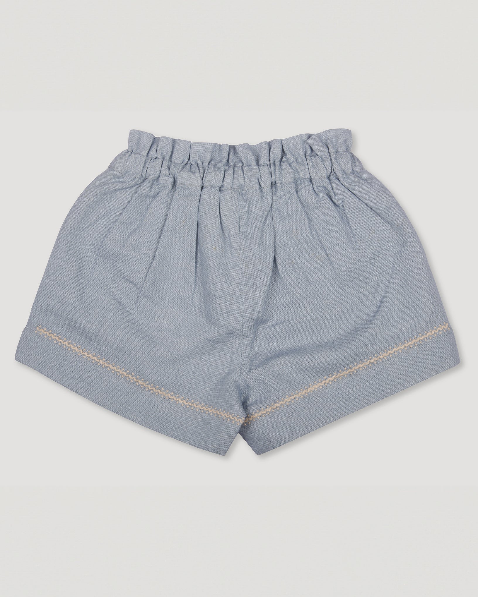 Early Sunday, Roman Shorts in Ocean Blue color, made from Canvas 70% Cotton 30% Linen fabric, featuring relaxed fit with delicate finishes, combining style and functionality, shown in a back flat lay view
