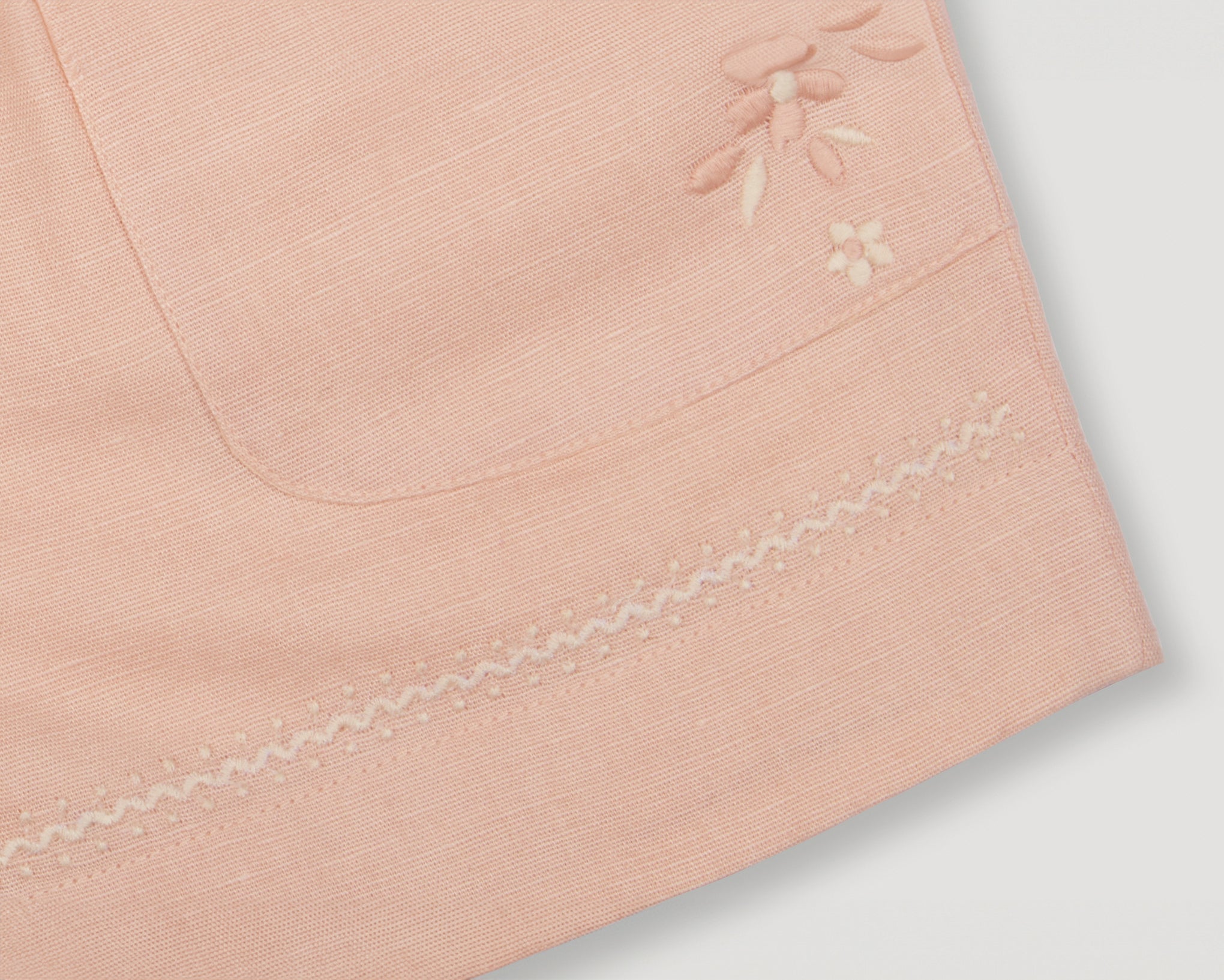 Early Sunday, Roman Shorts in Pink Sand color, made from Canvas 70% Cotton 30% Linen fabric, featuring relaxed fit with delicate finishes, combining style and functionality, shown in a detailed flat-lay view