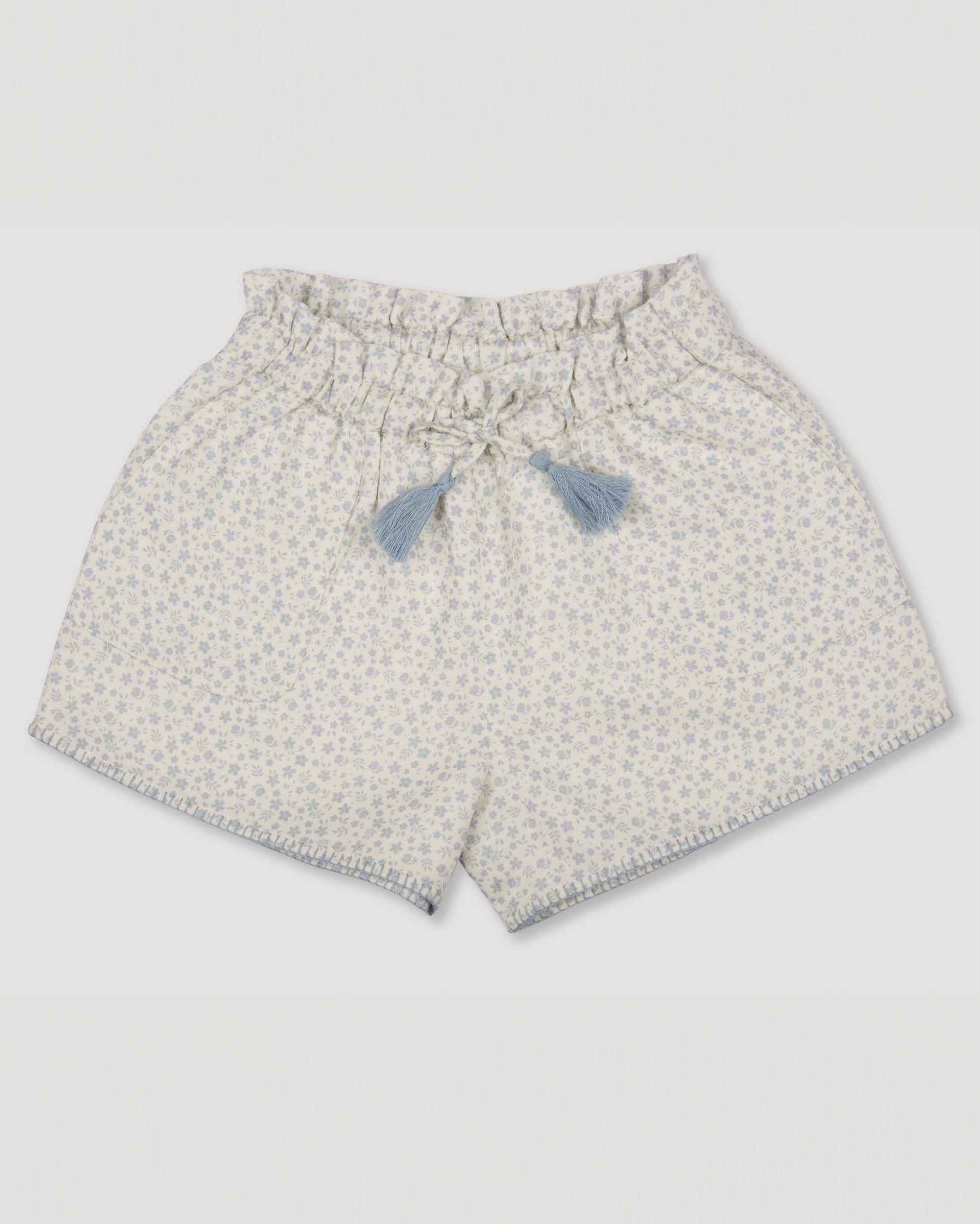 Early Sunday, Roman Shorts in Mini Flower print, made from Printed canvas 70% Cotton 30% Linen fabric, featuring relaxed fit with delicate finishes, combining style and functionality, shown in a front flat-lay view