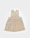 Early Sunday, Romy Blouse in Emma Floral Mint color, made from Organic Printed 60s Cotton Cambric fabric, featuring a sleeveless design with cross-back straps, a gathered waist & a soft flared silhouette, shown in a front flat-lay view
