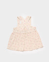 Early Sunday, Romy Blouse in Butterflies print, made from Printed Cotton Tiny Swiss Dobby fabric, featuring a sleeveless design with cross-back straps, a gathered waist & a soft flared silhouette, shown in back flat-lay view