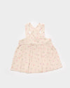 Early Sunday, Romy Blouse in Butterflies print, made from Printed Cotton Tiny Swiss Dobby fabric, featuring a sleeveless design with cross-back straps, a gathered waist & a soft flared silhouette, shown in front flat-lay view