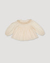 Early Sunday, Rosa Blouse in Hazelnut Cream, made from All-Over Embroidered Cotton Cambric fabric, featuring Frilled neckline detailed with a lace collar for a vintage touch, shown in a back flat-lay view