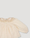 Early Sunday, Rosa Blouse in Hazelnut Cream, made from All-Over Embroidered Cotton Cambric fabric, featuring Frilled neckline detailed with a lace collar for a vintage touch, shown in a closeup flat-lay view
