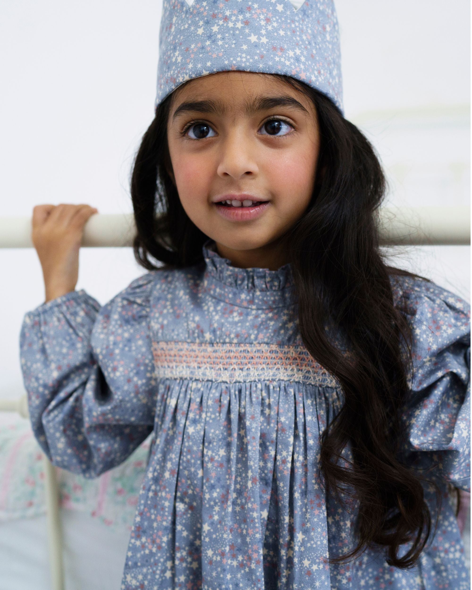 Early Sunday, Rosa Blouse in Celestial print, made from Printed Cotton Satin fabric, featuring Frilled neckline detailed with a lace collar for a vintage touch, shown in a close up shot of model wearing it