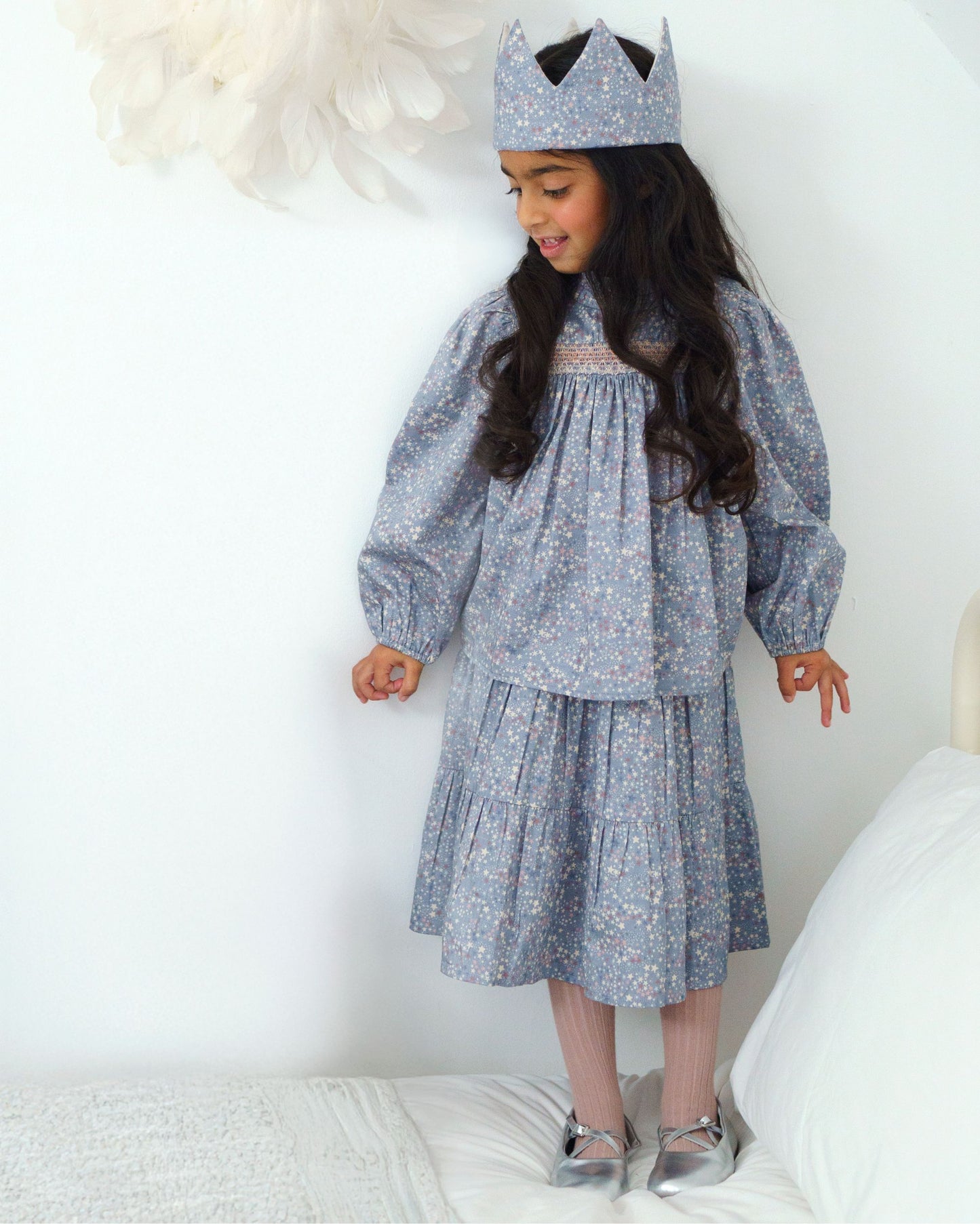 Early Sunday, Rosa Blouse in Celestial print, made from Printed Cotton Satin fabric, featuring Frilled neckline detailed with a lace collar for a vintage touch, shown in a front view of model wearing it