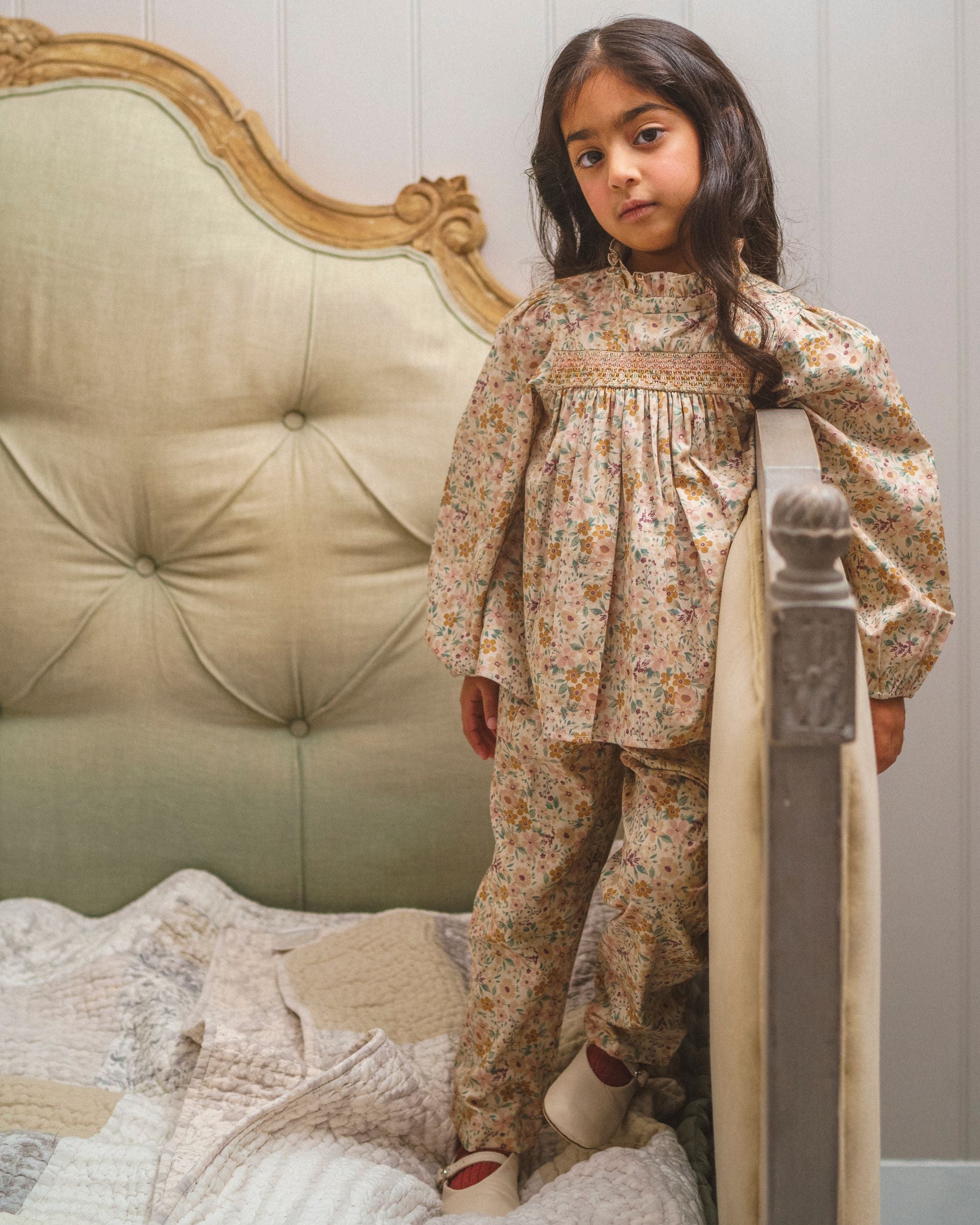 Early Sunday, Rosa Blouse in Floral print, made from Printed Cotton Satin fabric, featuring Frilled neckline detailed with a lace collar for a vintage touch, shown in a front view of model wearing it