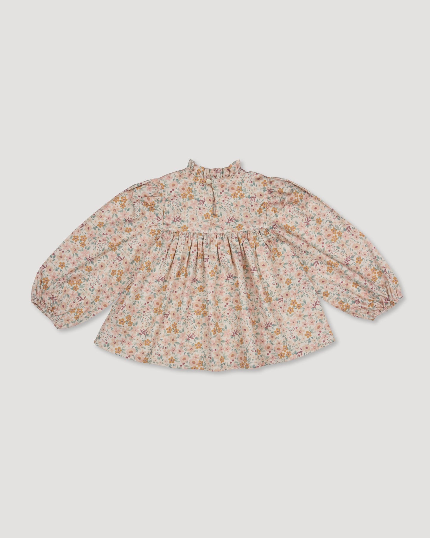 Early Sunday, Rosa Blouse in Floral print, made from Printed Cotton Satin fabric, featuring Frilled neckline detailed with a lace collar for a vintage touch, shown in a back flat-lay view