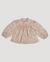 Early Sunday, Rosa Blouse in Floral print, made from Printed Cotton Satin fabric, featuring Frilled neckline detailed with a lace collar for a vintage touch, shown in a front flat-lay view