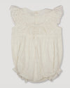 Early Sunday, Rose Baby Bubble Romper in Ivory color, made from All-Over Eyelet Embroidered Cotton Schifflie fabric, featuring gathered bubble silhouette for a cute and comfortable fit, with a relaxed design that allows for ease of movement, shown in a back flat-lay view