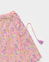 Early Sunday, Ruth Skirt in Emma Floral Purple color, made from Organic Printed Cotton Cambric fabric, featuring a flared silhouette with an elastic waistband & floral design, shown in a closeup flat-lay view