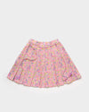 Early Sunday, Ruth Skirt in Emma Floral Purple color, made from Organic Printed Cotton Cambric fabric, featuring a flared silhouette with an elastic waistband & floral design, shown in a front flat-lay view