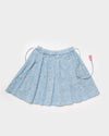 Early Sunday, Ruth Skirt in Tonal Floral Blue color, made from Printed Cotton Tiny Swiss Dobby fabric, featuring a flared silhouette with an elastic waistband & floral design, shown in a back flat-lay view