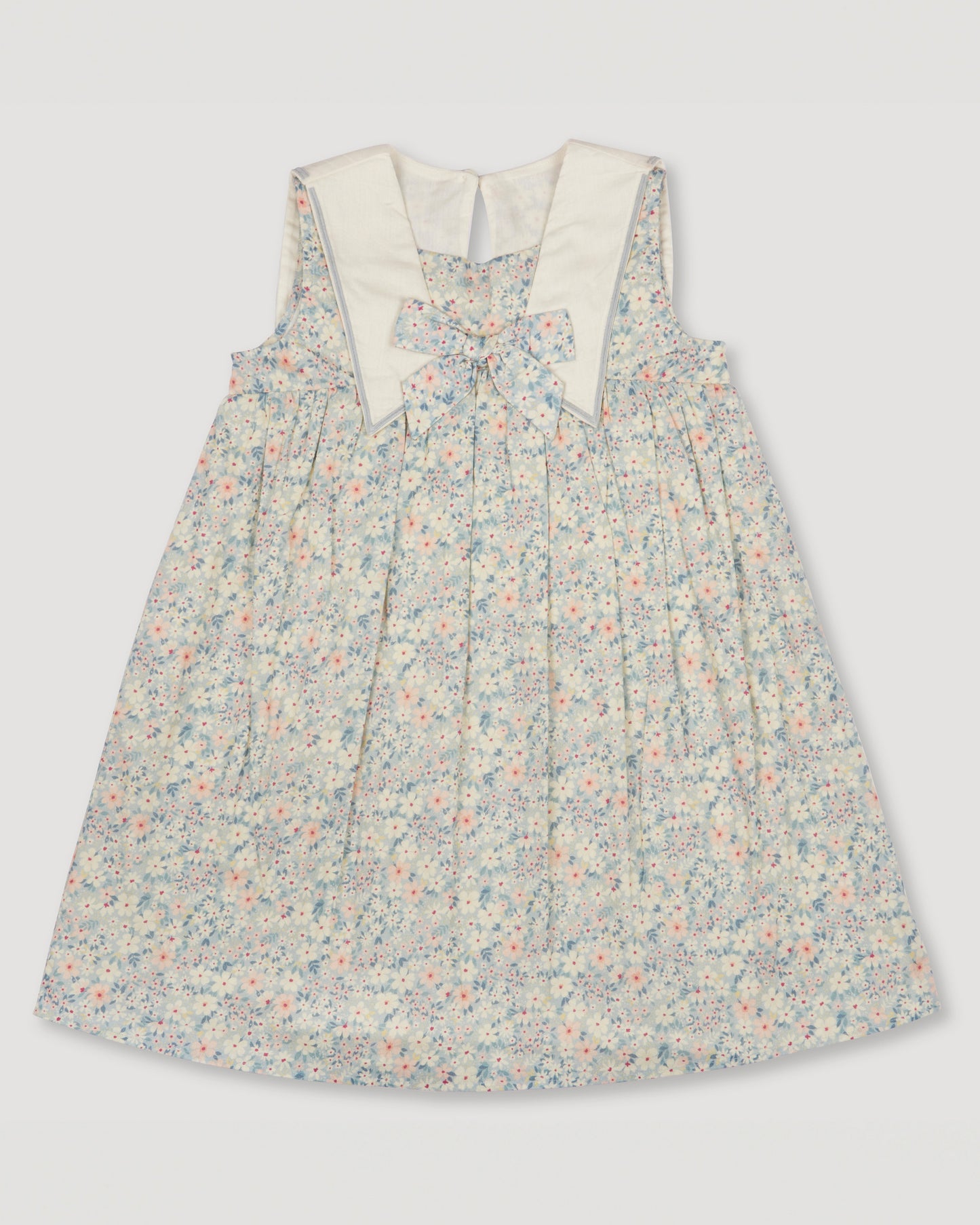 Early Sunday, Sabrina Dress in Amelia print, made from Printed Cotton Cambric fabric, featuring flattering fit with delicate finishes, combining style and functionality for an effortlessly elegant look, shown in a front flat lay view