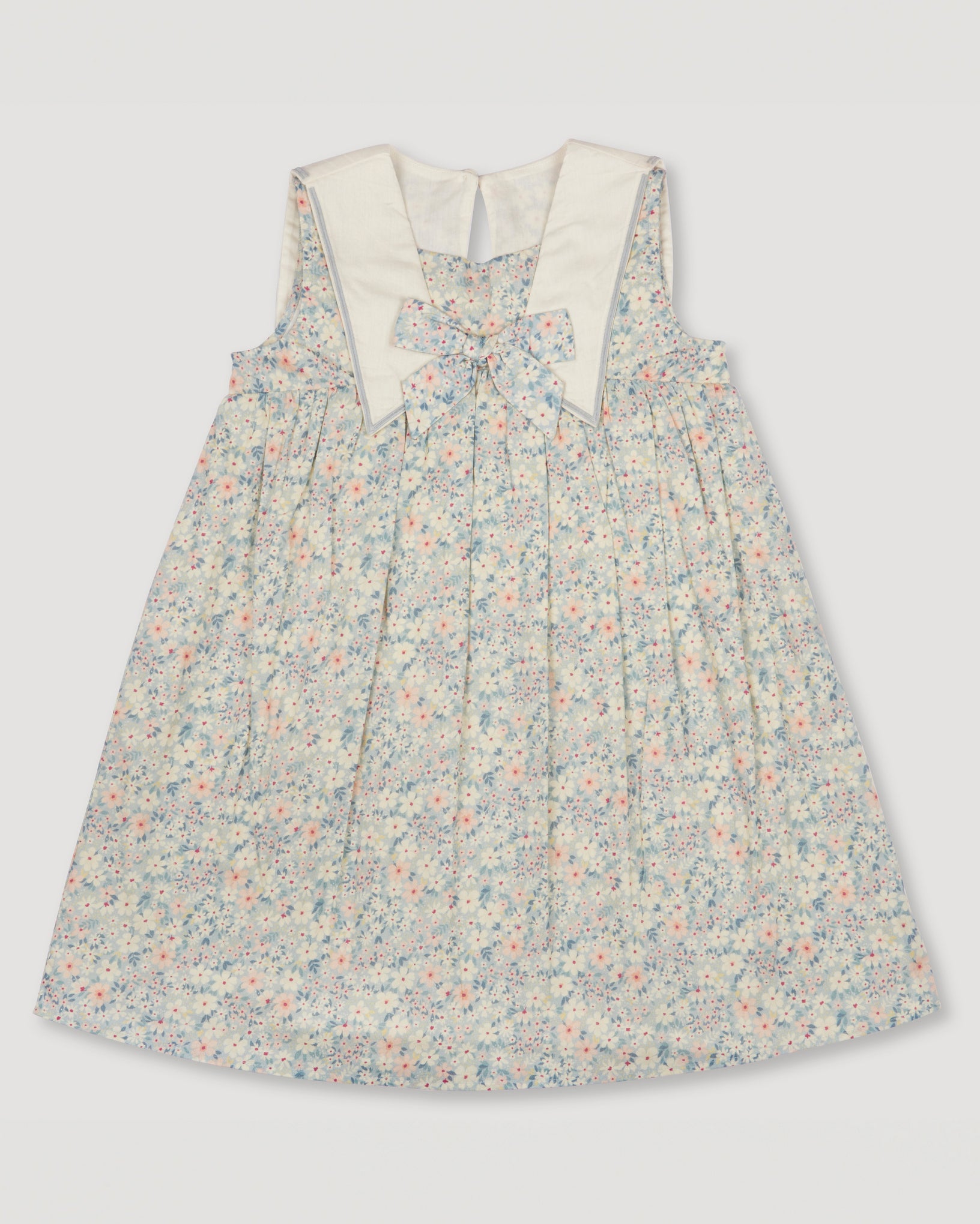 Early Sunday, Sabrina Dress in Amelia print, made from Printed Cotton Cambric fabric, featuring flattering fit with delicate finishes, combining style and functionality for an effortlessly elegant look, shown in a front flat lay view