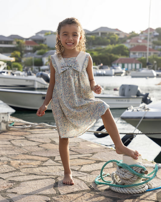 Early Sunday, Sabrina Dress in Amelia print, made from Printed Cotton Cambric fabric, featuring flattering fit with delicate finishes, combining style and functionality for an effortlessly elegant look, shown in a front view of model wearing it