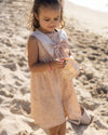 Early Sunday, Sabrina Dress in Garden Flowers print, made from Printed Cotton Cambric fabric, featuring flattering fit with delicate finishes, combining style and functionality for an effortlessly elegant look, shown in an outdoor shot of model wearing it