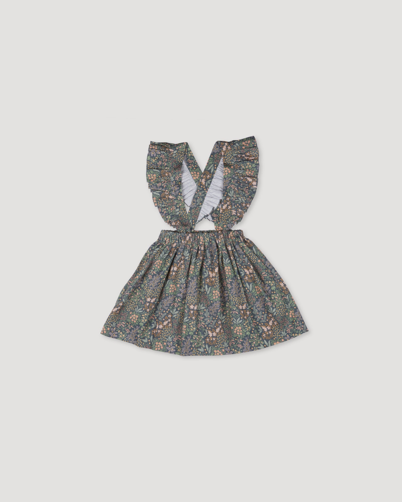 Early Sunday, Selma Skirt in Autumn Garden Greyish Blue, made from Printed Cotton Satin fabric, featuring dungaree style with adjustable straps, shown in a front flat-lay view